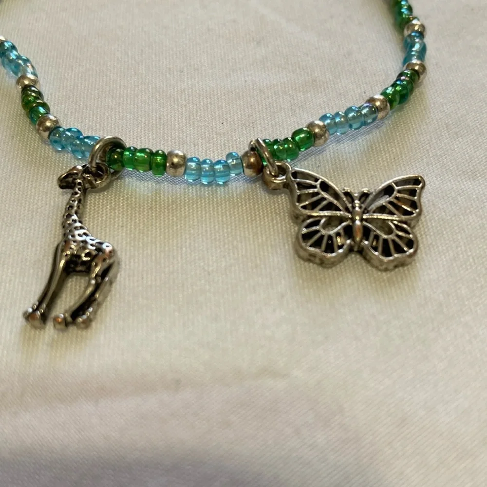 Giraffe and Butterfly green and light blue beaded bracelet Festival seashell,
